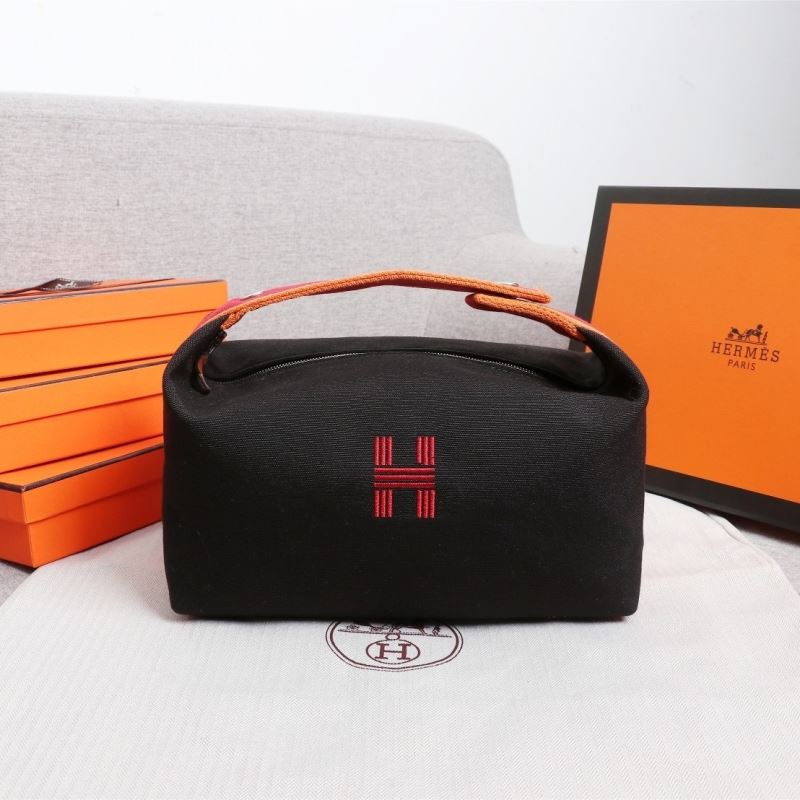 H**mes clutch bags